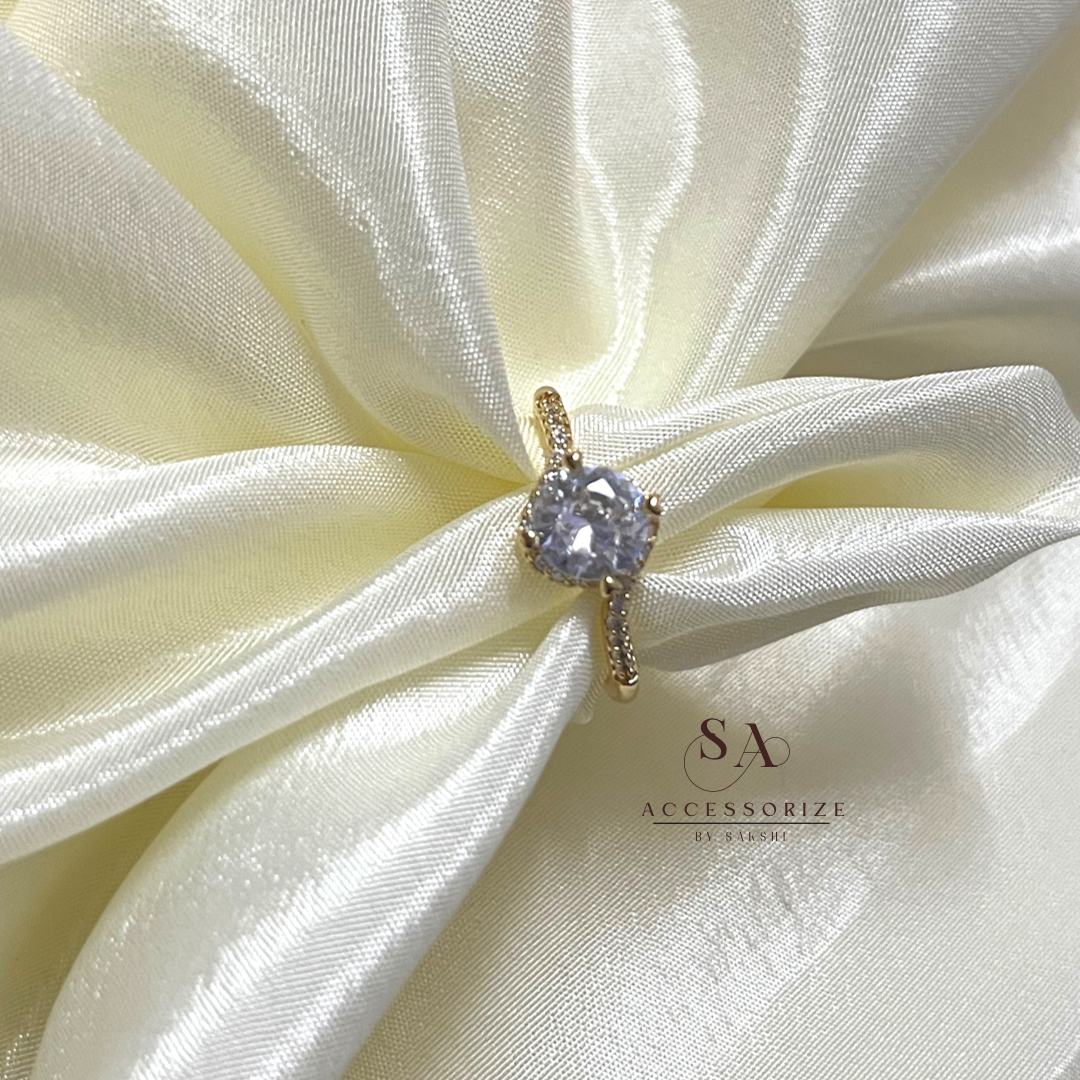 Gold solitaire ring