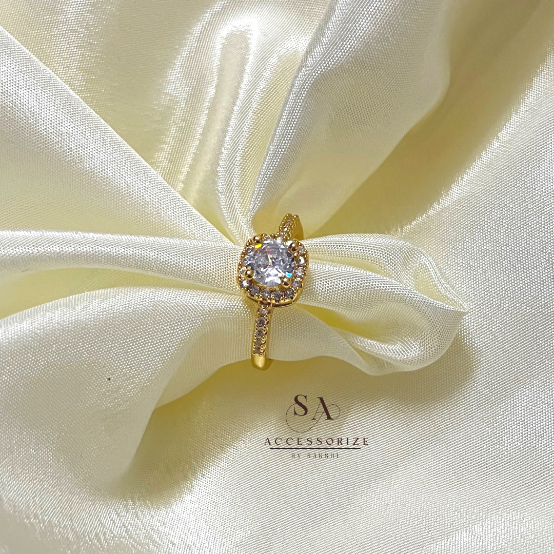 Gold solitaire ring