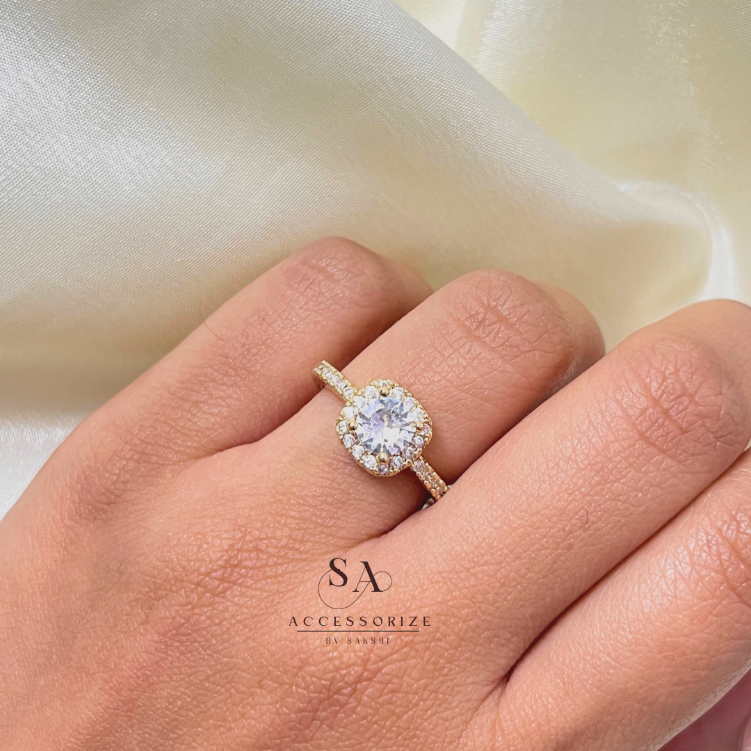 Gold solitaire ring
