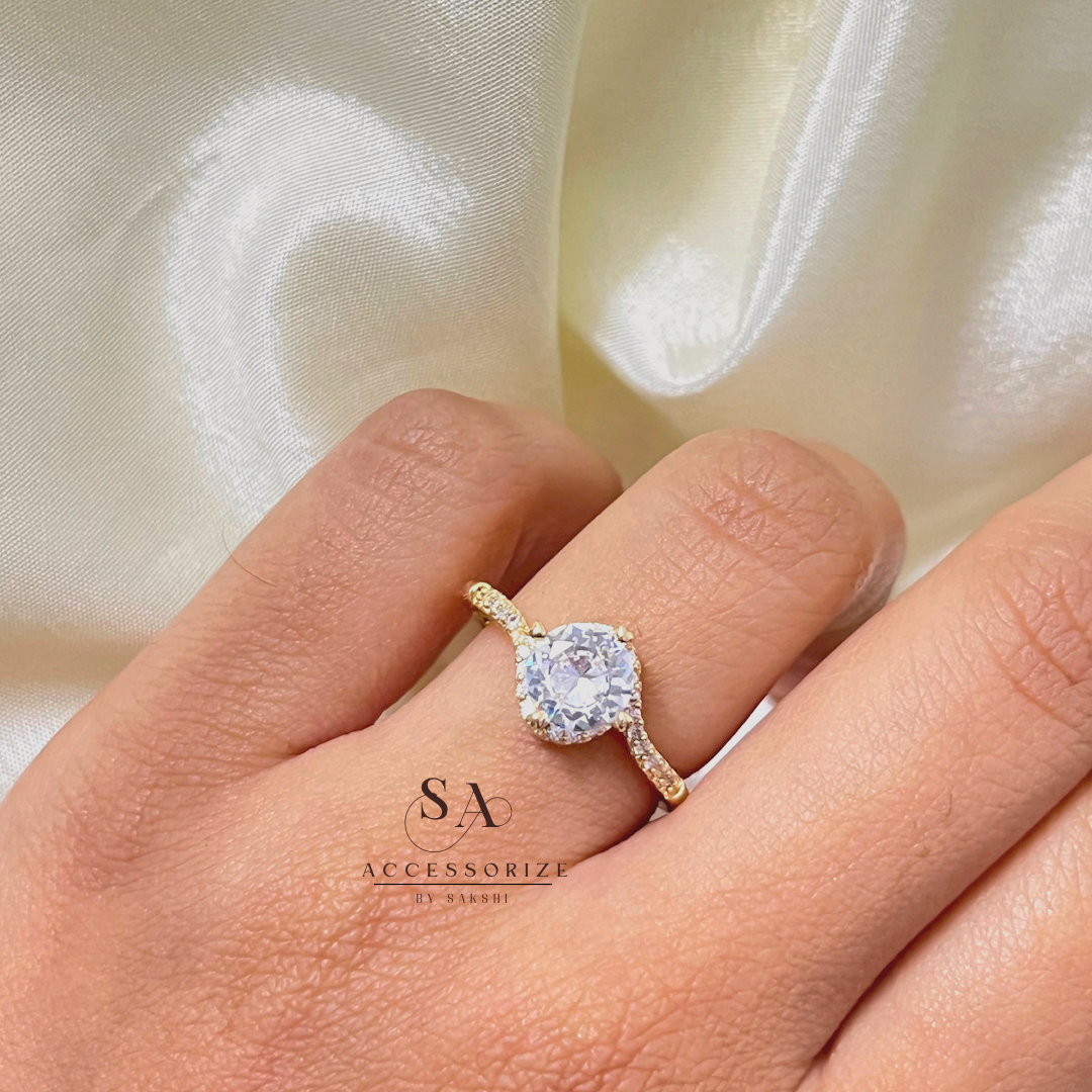 Gold solitaire ring